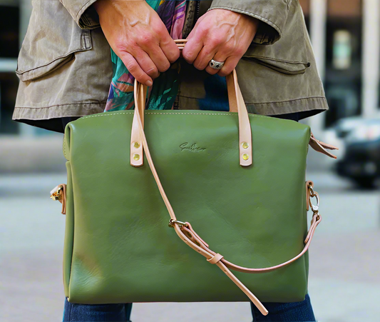 Compact full-grain sage green leather laptop bag – Handmade, durable, and stylish. Perfect for professionals on the go, featuring a sleek design with ample storage. Women-owned business.